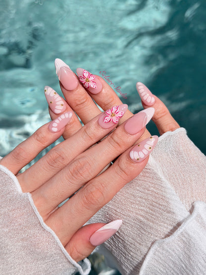 Belle Rose almond press-on nails with milky pink French tips, hand-painted petals and 3D floral accent – Éclaire Studio
