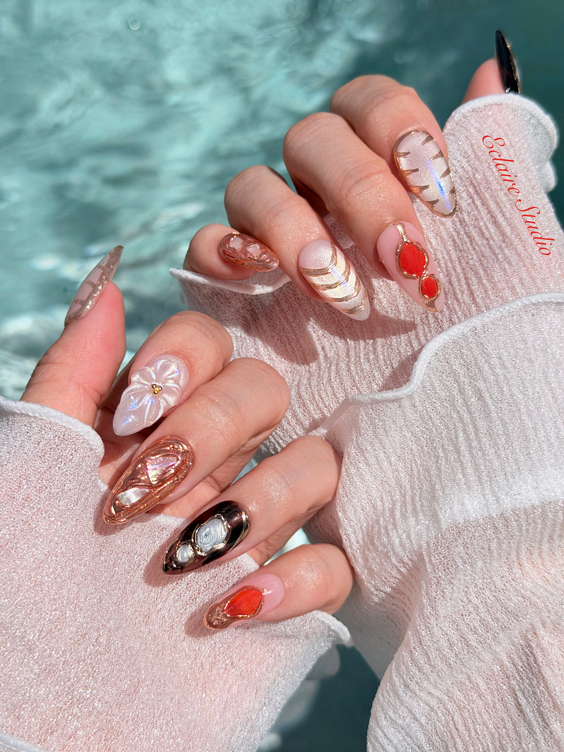 Treasure pearlescent cat-eye press-on nails with gold-bezeled amber, coral, agate and abalone inlays – Éclaire Studio