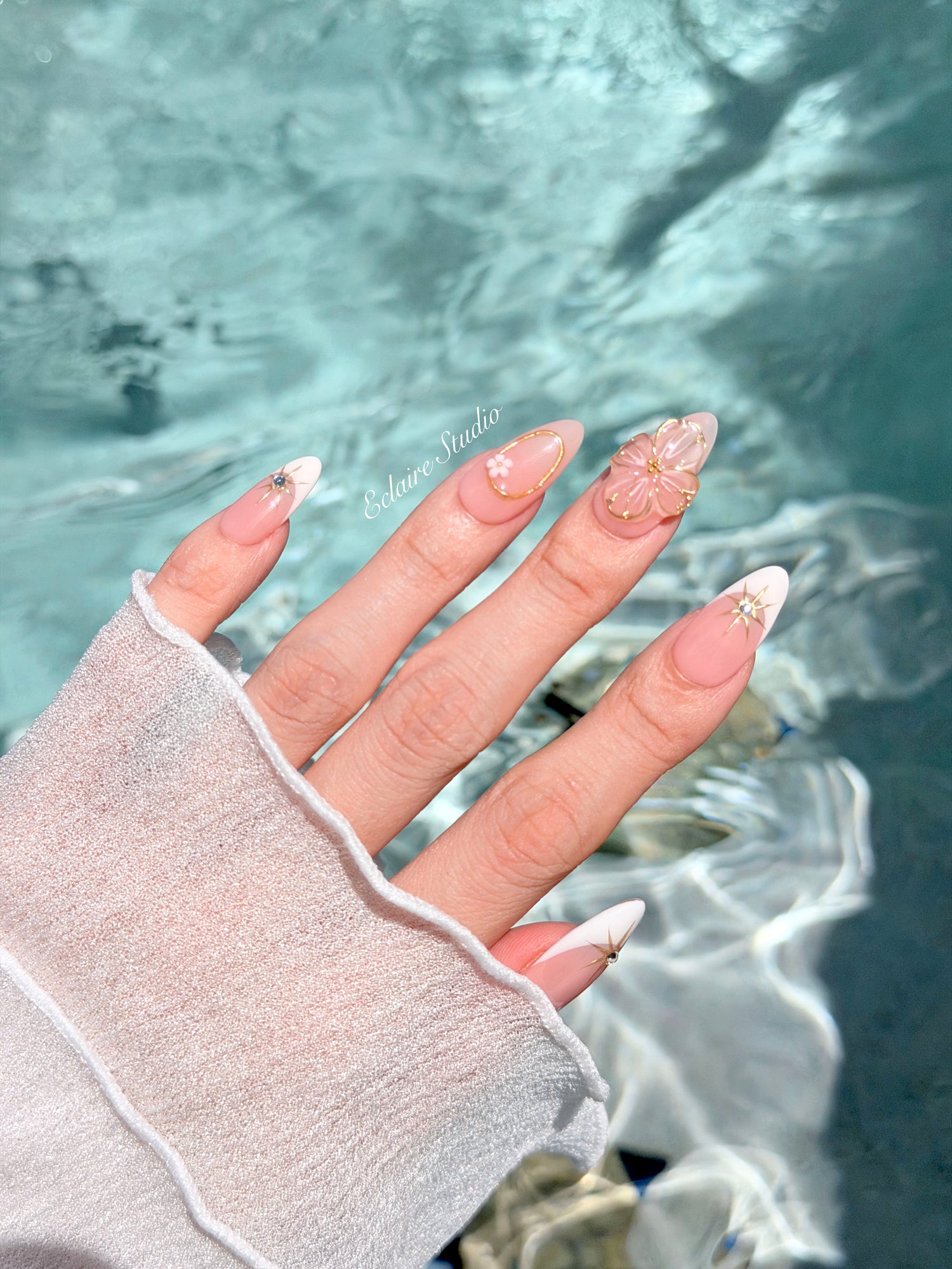 Golden Fleur white French tip press-on nails with 3D cherry blossom florals and gold starbursts – Éclaire Studio