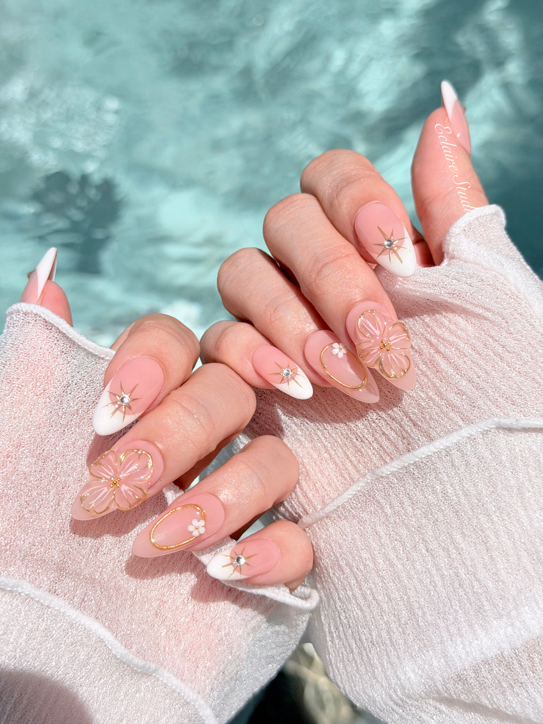 Golden Fleur white French tip press-on nails with 3D cherry blossom florals and gold starbursts – Éclaire Studio